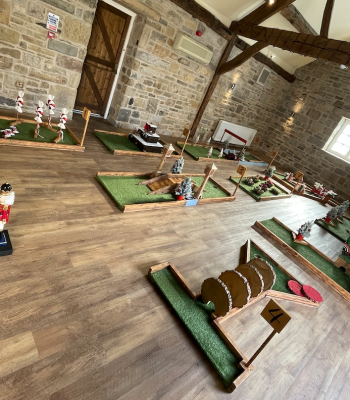 Christmas mini golf hire set up for a corporate Christmas party in Yorkshire